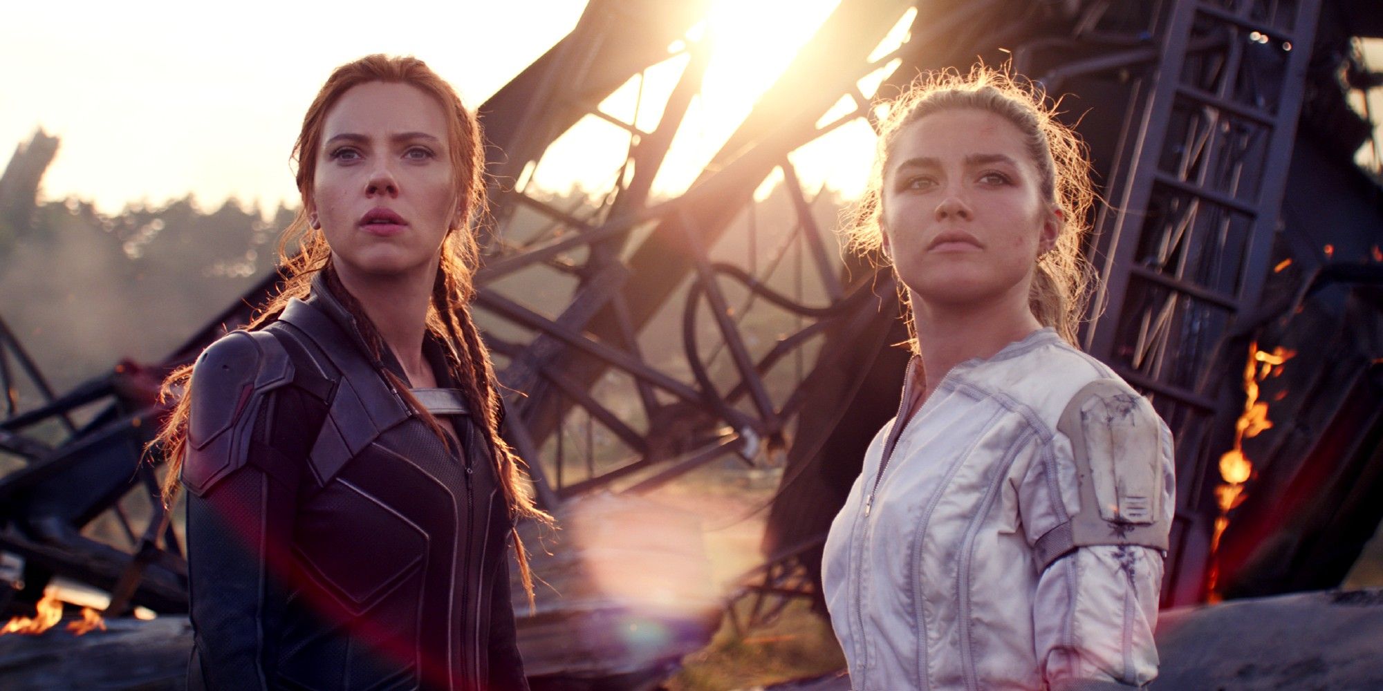 Natasha and Yelena standing amongst the ruins in Black Widow