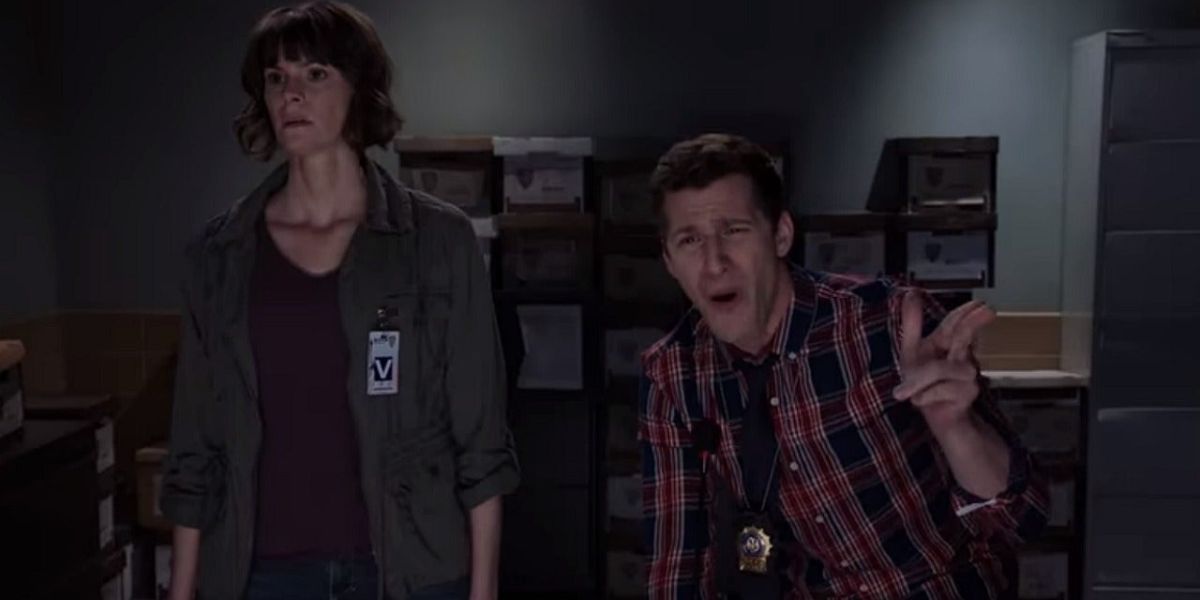 Jake singing along with suspects in a lineup on Brooklyn Nine-Nine