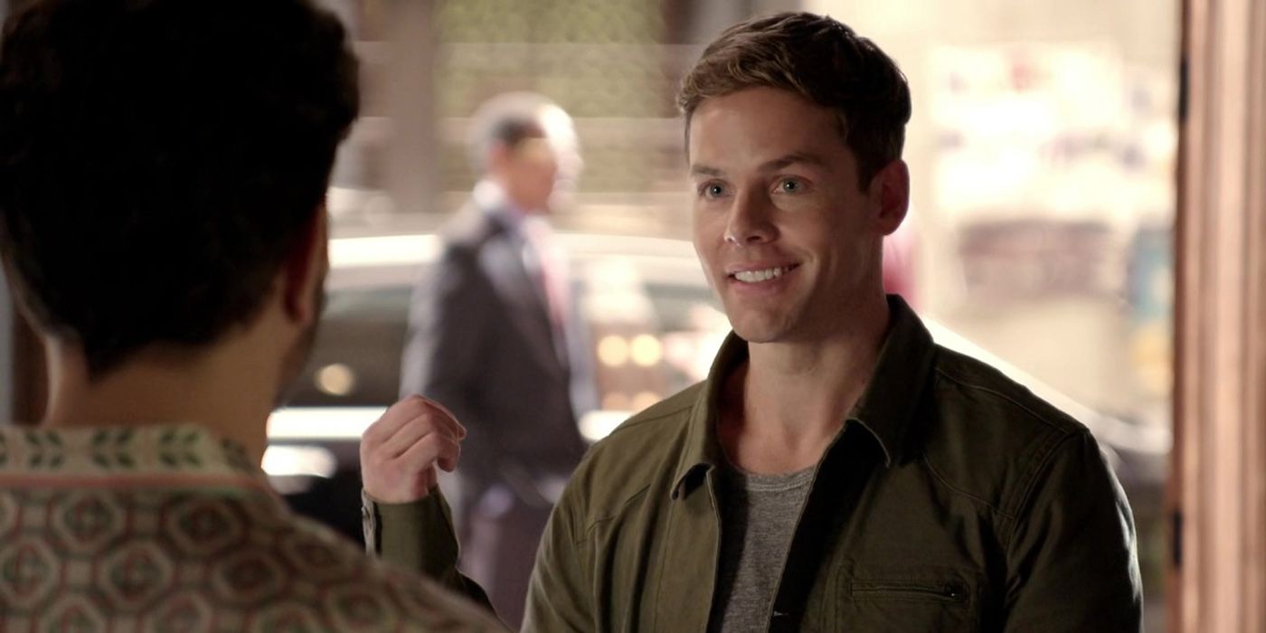 Ryan from Dynasty smiling and looking at Sammy Jo.