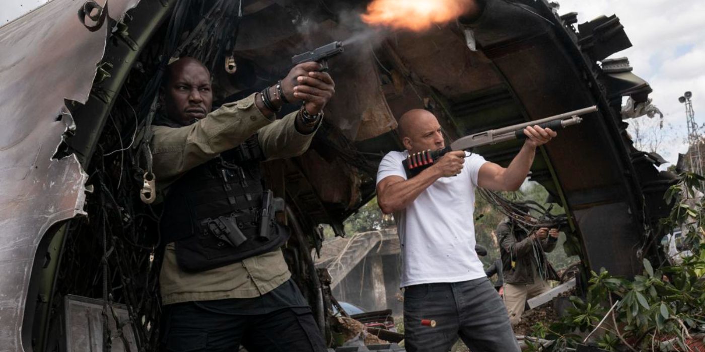 Roman and Dom shoot at soldiers at the wreckage of Mr. Nobody's plane in Fast 9