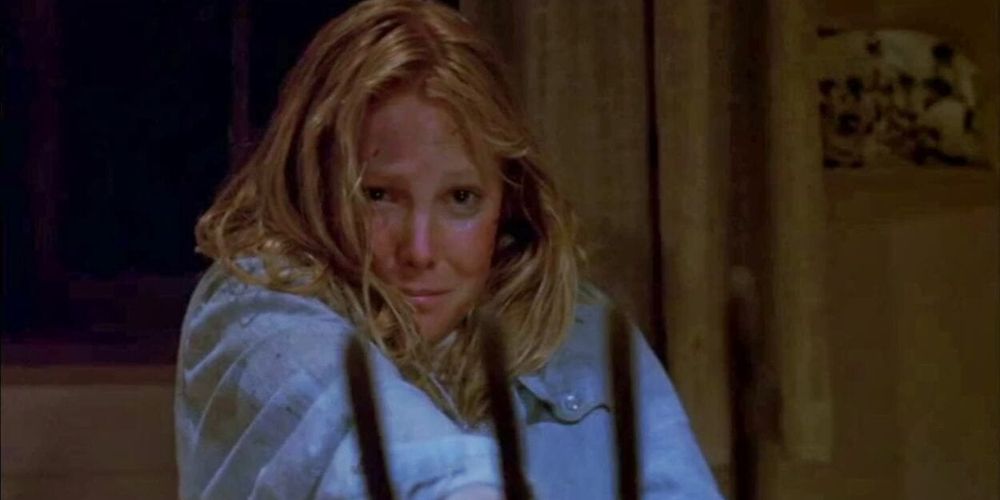 Ginny holds pitchfork in Friday the 13th Part 2
