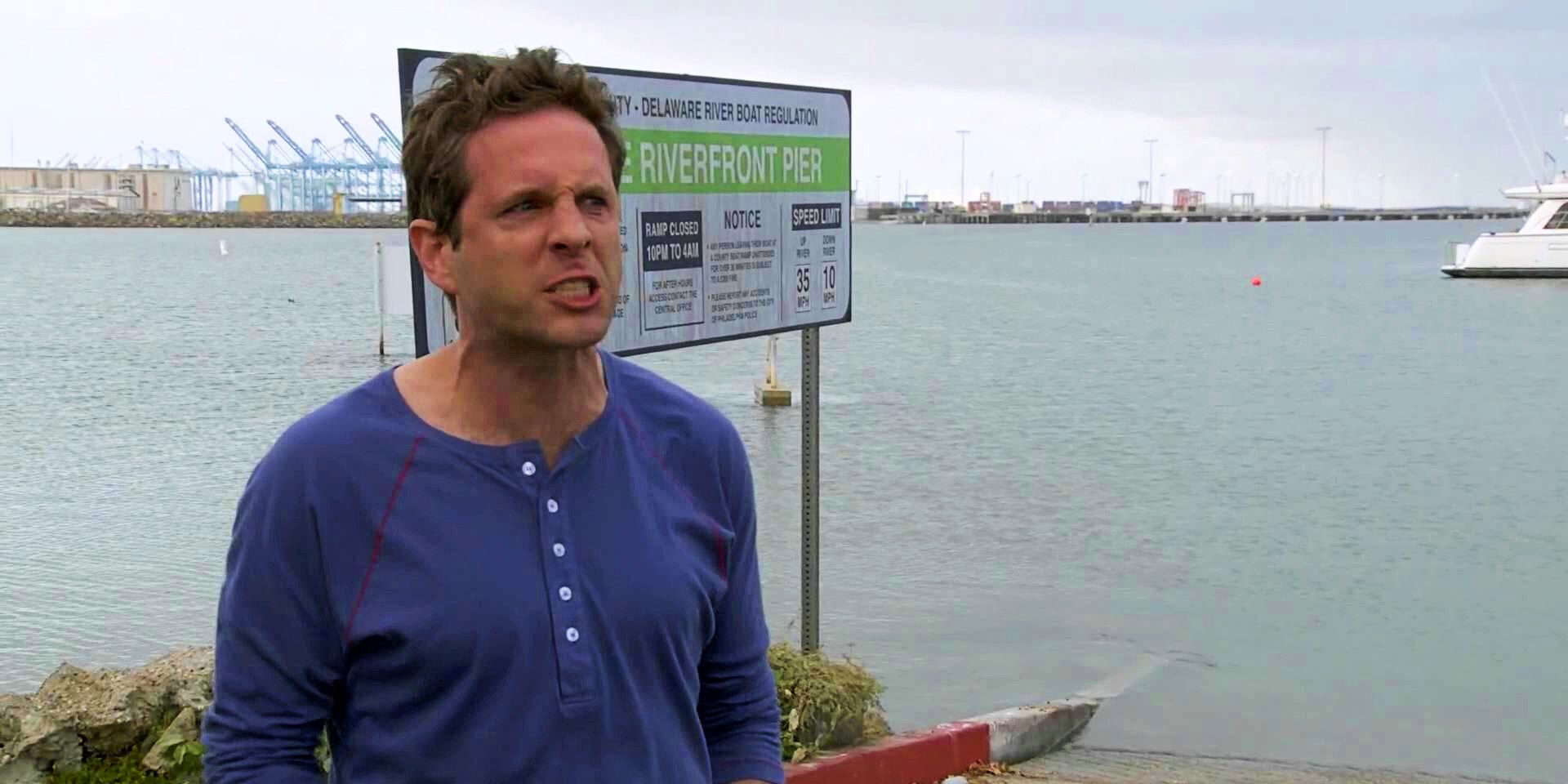 Dennis angrily shouts in front of a port in It's Always Sunny in Philadelphia.