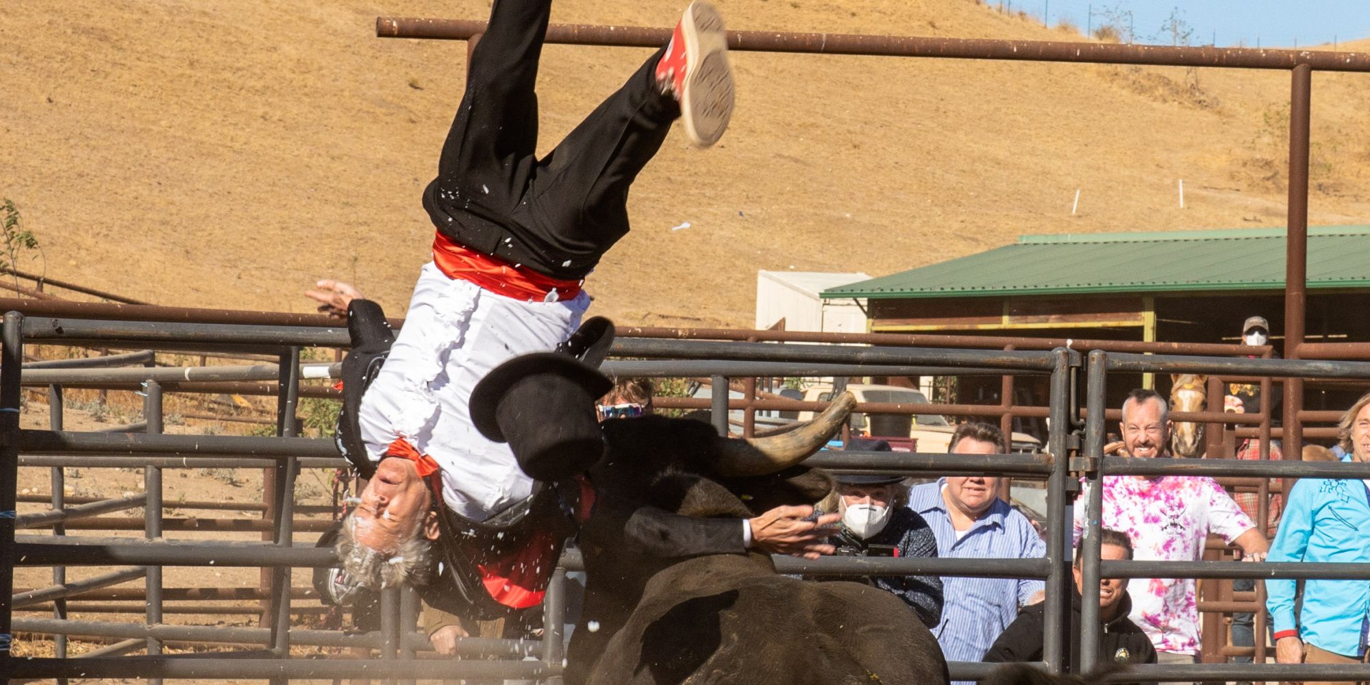 Johnny Knoxville is flipped upside down by a bull in Jackass Forever