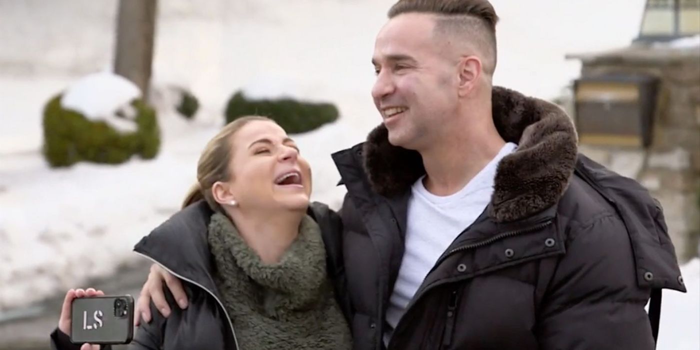 Mike and Lauren getting teary-eyed outside, wearing winter jackets on Jersey Shore: Family Vacation.