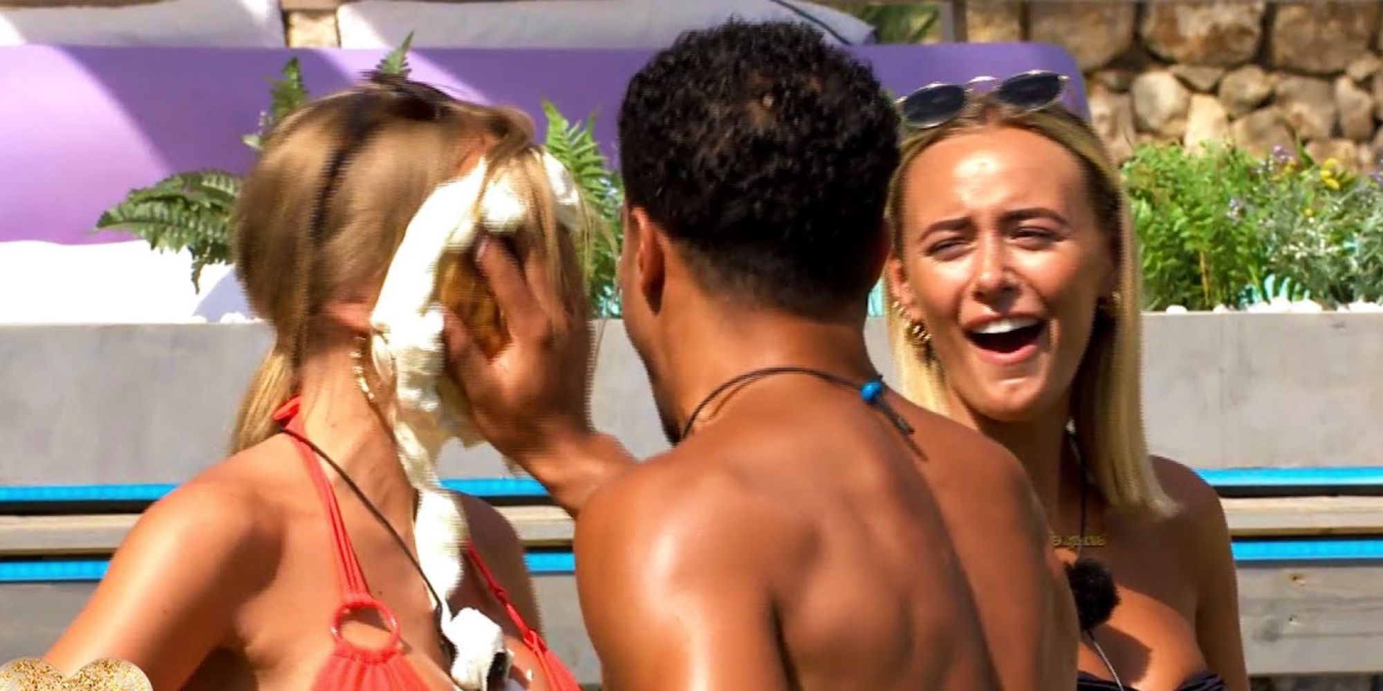 Love Island U.K. contestants participate in a pie-in-the-face challenge