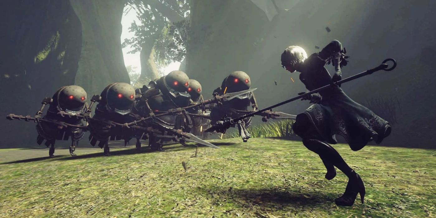 2B fightinga horde of robotic enemies in a forest in NieR:Automata.
