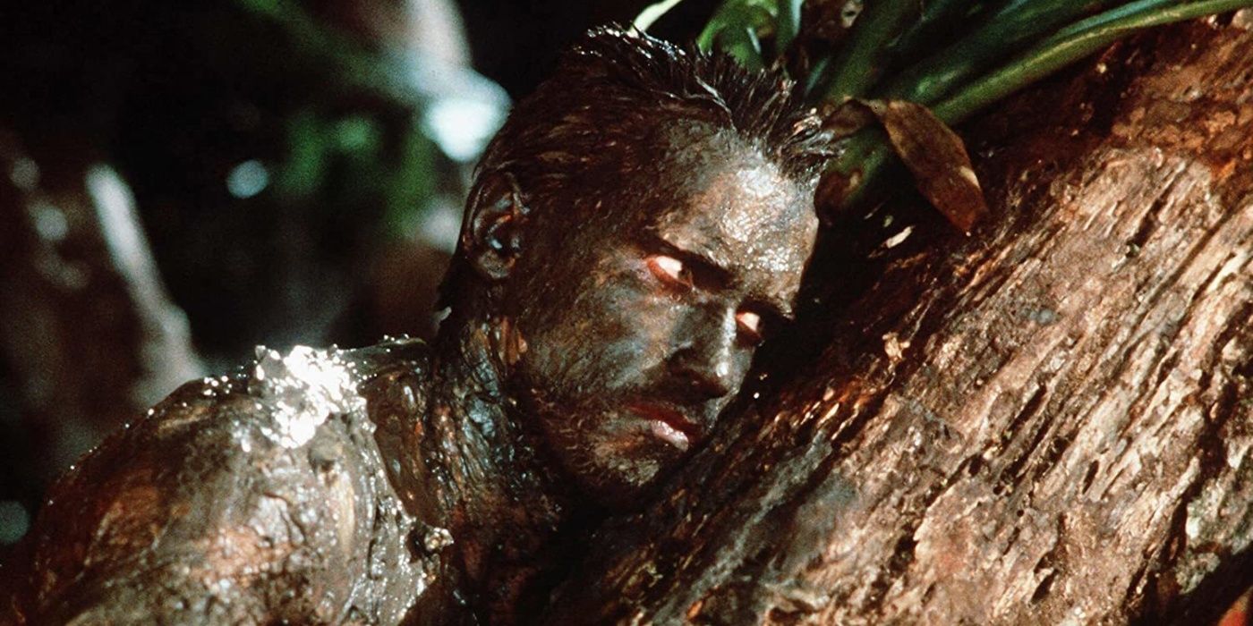 Arnold Schwarzenegger predator mud camouflage scene