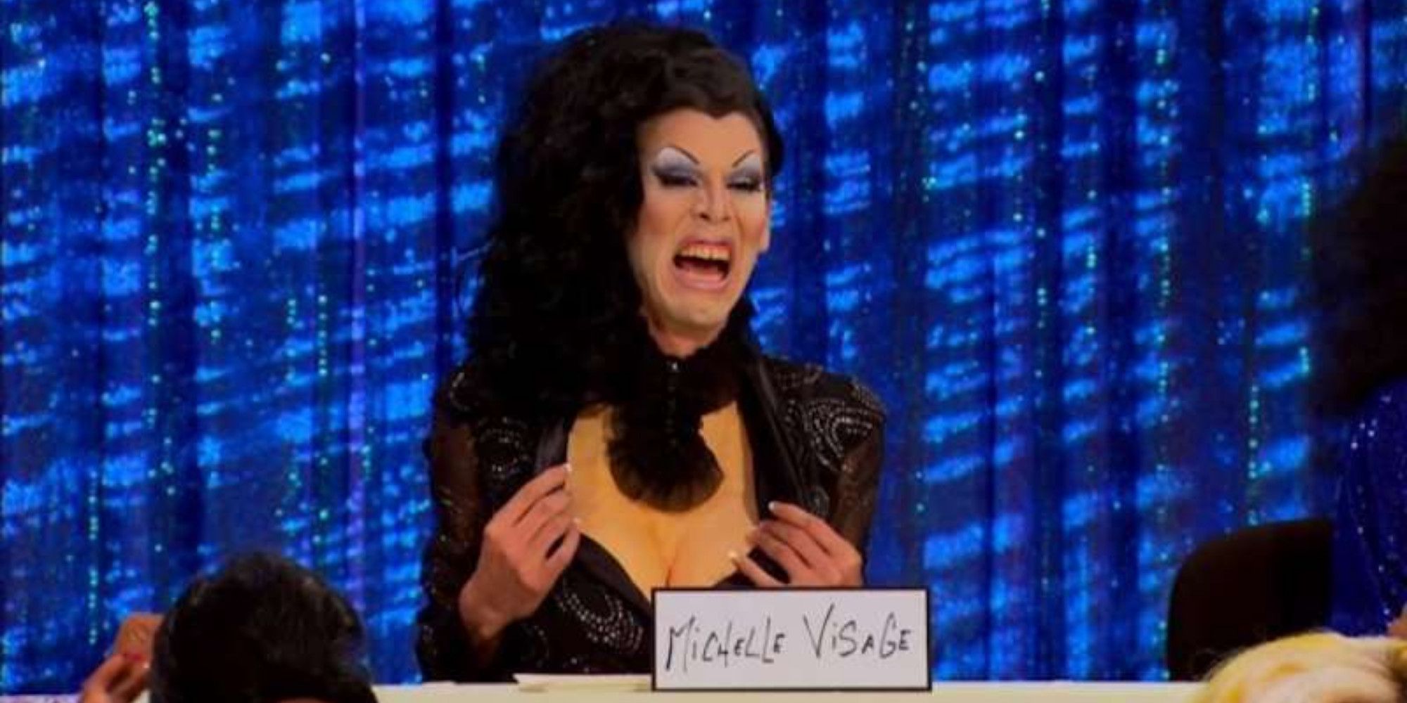 Drag queen Sharon Needles portrays Michelle Visage in the Snatch Game on RuPaul's Drag Race