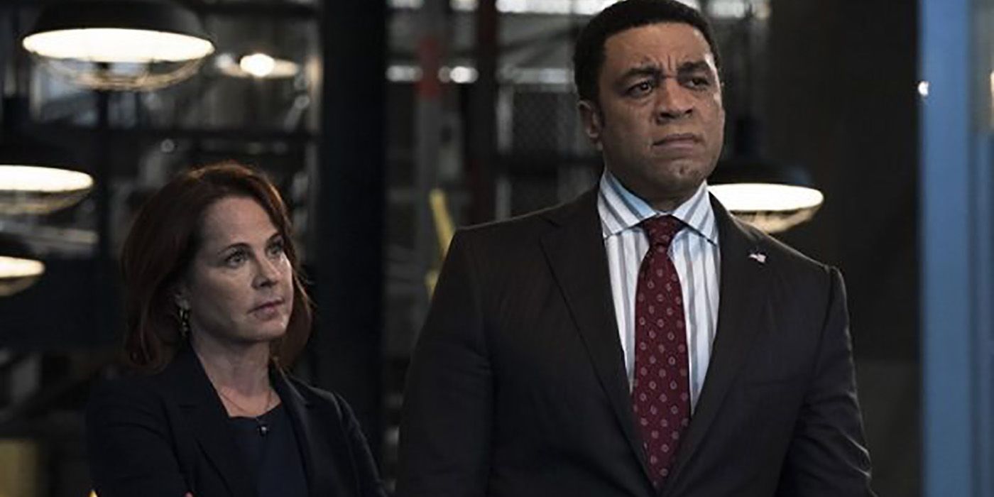 Cynthia and Harold from The Blacklist standing side by side.