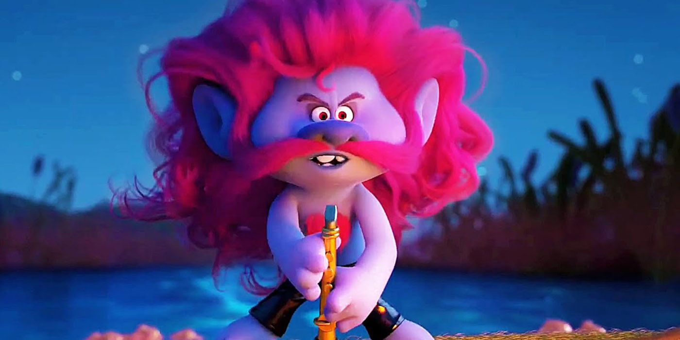 Chaz from Trolls World Tour, sitting with an instrument.