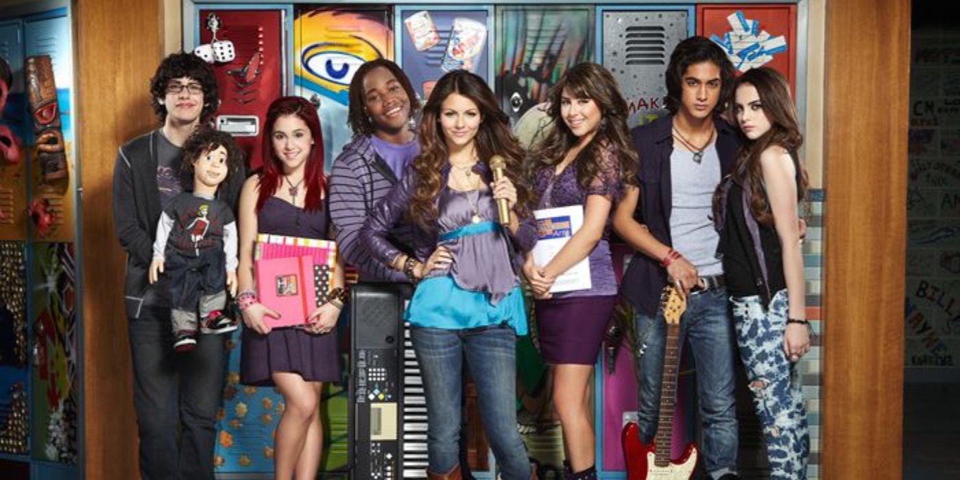 The cast of Victorious on Nickelodeon in front of a bank of lockers