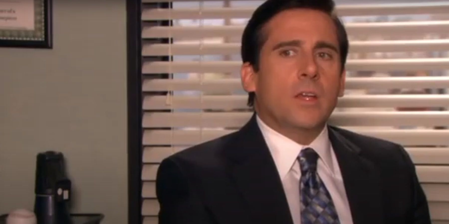 Michael Scott talking to the camera in The Office