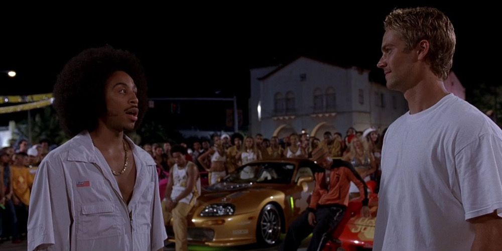 Tej speaks with Brian before a race in 2 Fast 2 Furious