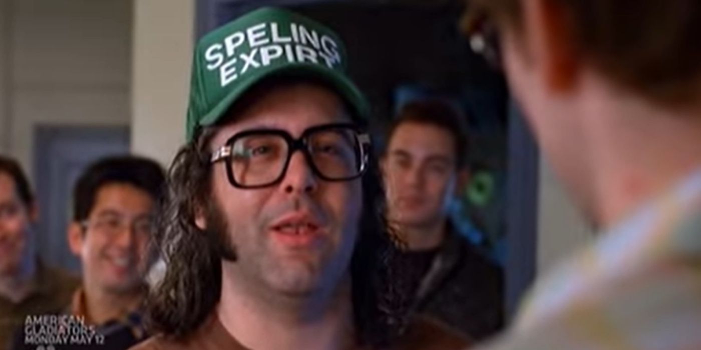 Frank wearing a hat that says Speling Expirt in 30 Rock