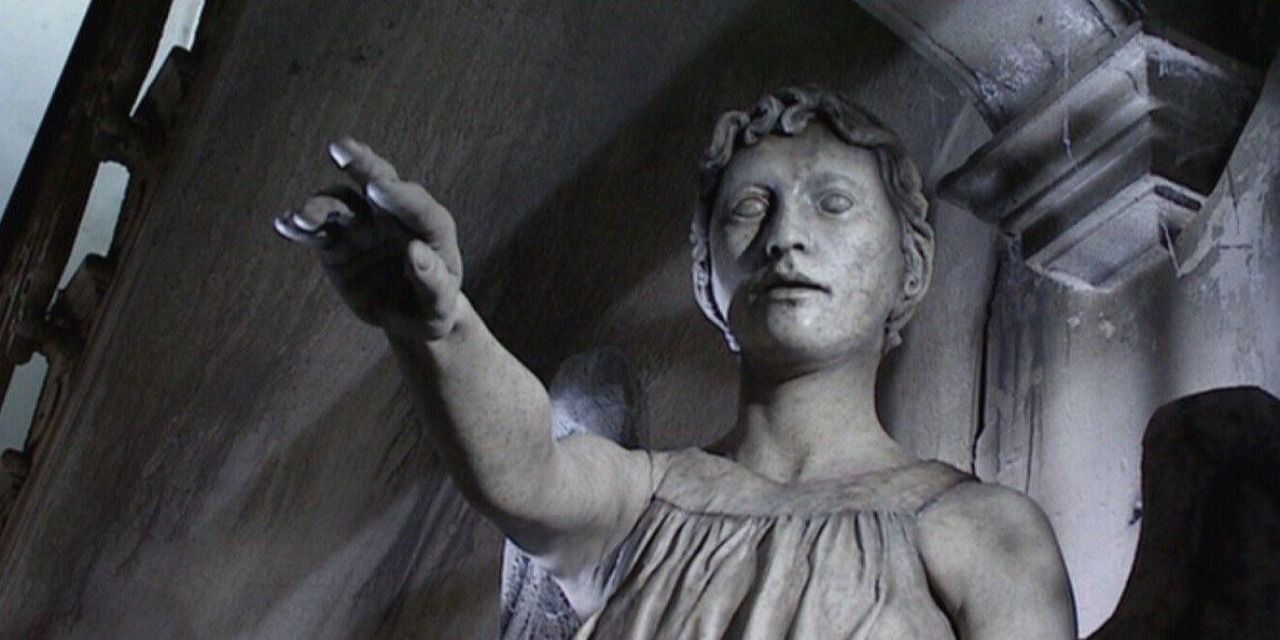 A weeping Angel reaching out for someone in Doctor Who