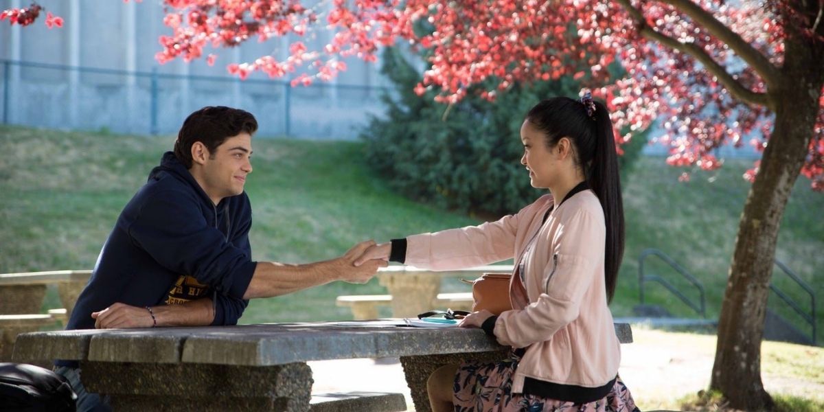 Lara Jean and Peter shaking hands in To All The Boys I've Loved Before