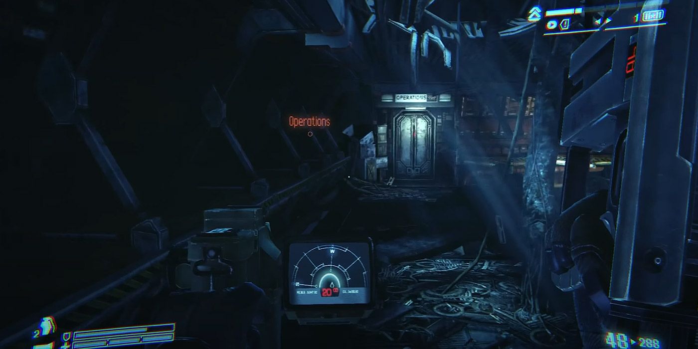 A marine with a motion tracker walking down a corridor in Aliens: Colonial Marines