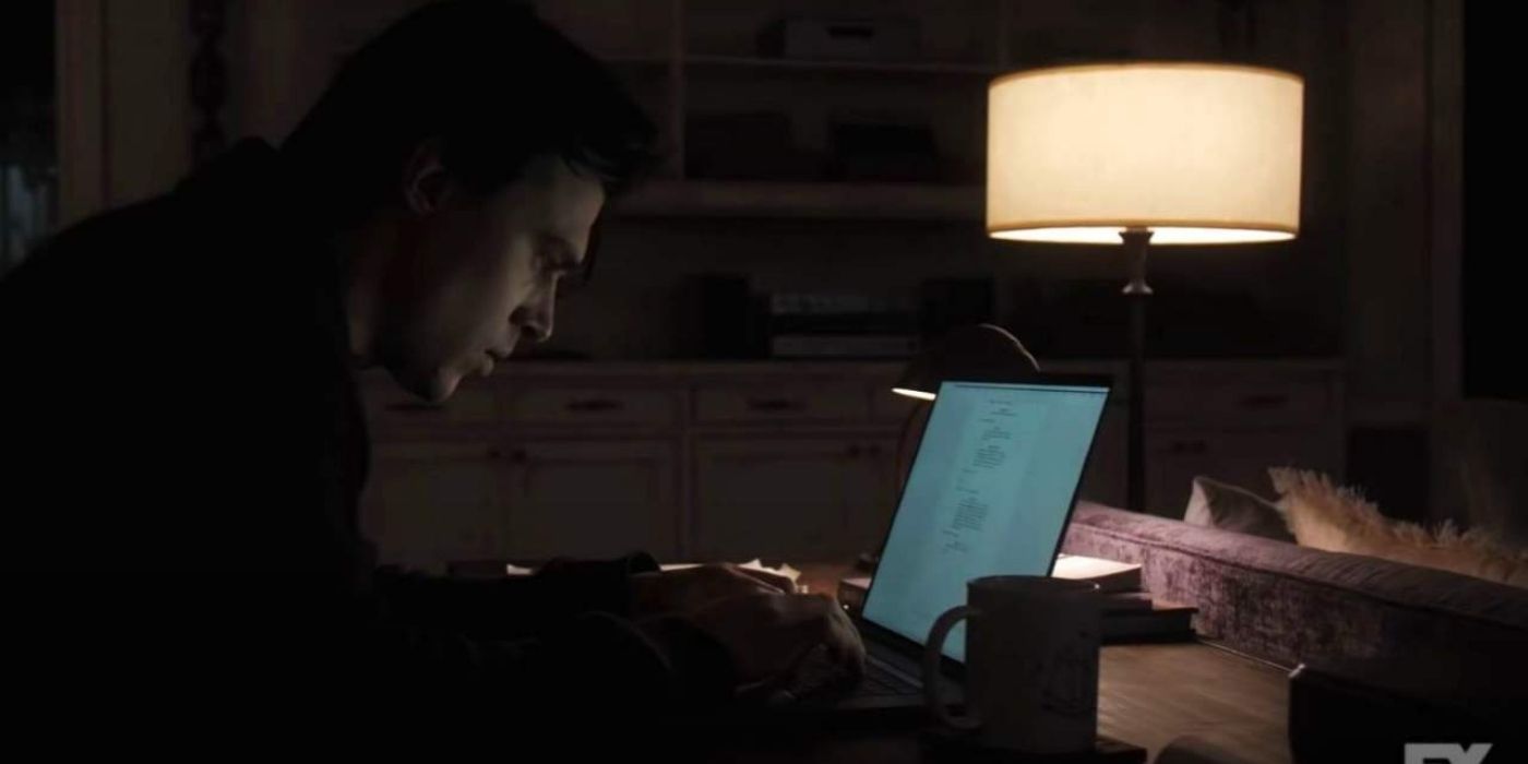 Finn Wittrock's character writing in a laptop in AHS: Double Feature