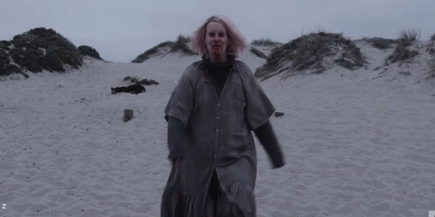 Sarah Paulson's character walking down a beach in American-Horror-Story-Double-Feature