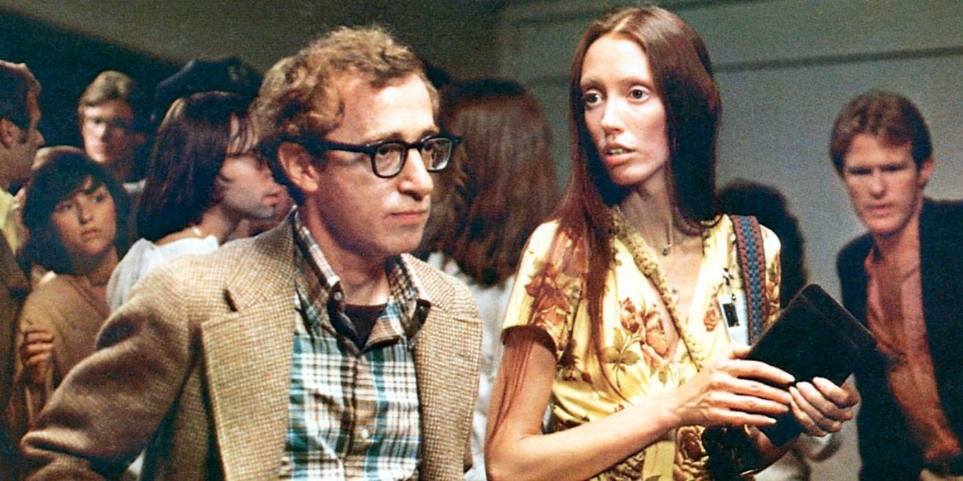Albie and Pam standing side by side in Annie Hall