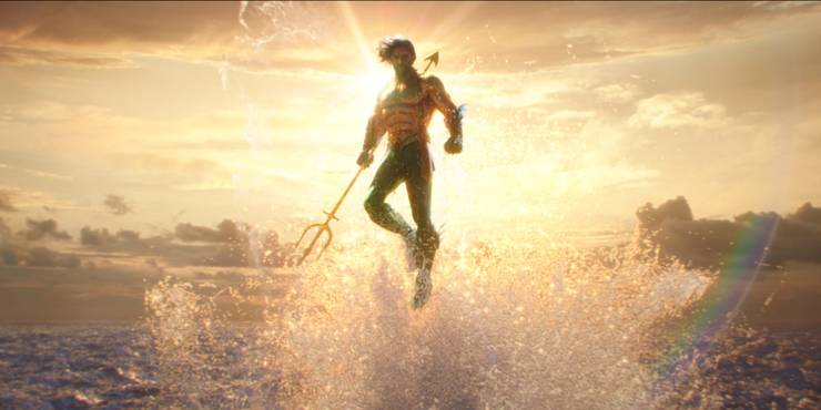 Aquaman breaching out of the ocean in James Wans Aquaman.jpg?q=50&fit=crop&w=740&h=370&dpr=1