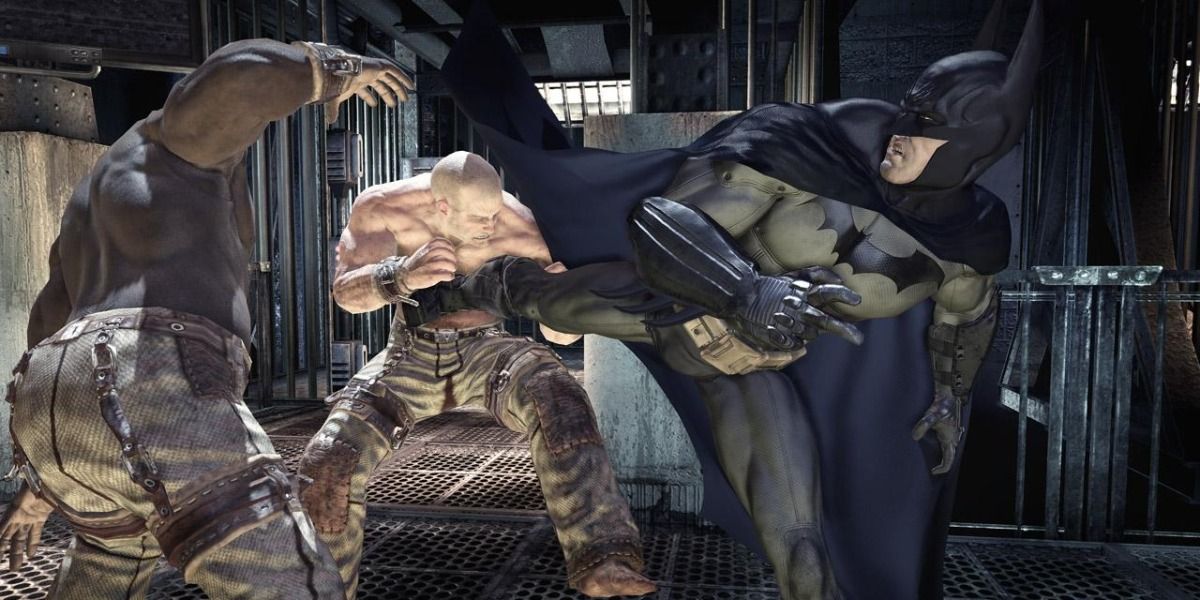 Batman fighting Arkham thugs in Batman: Arkham Asylum