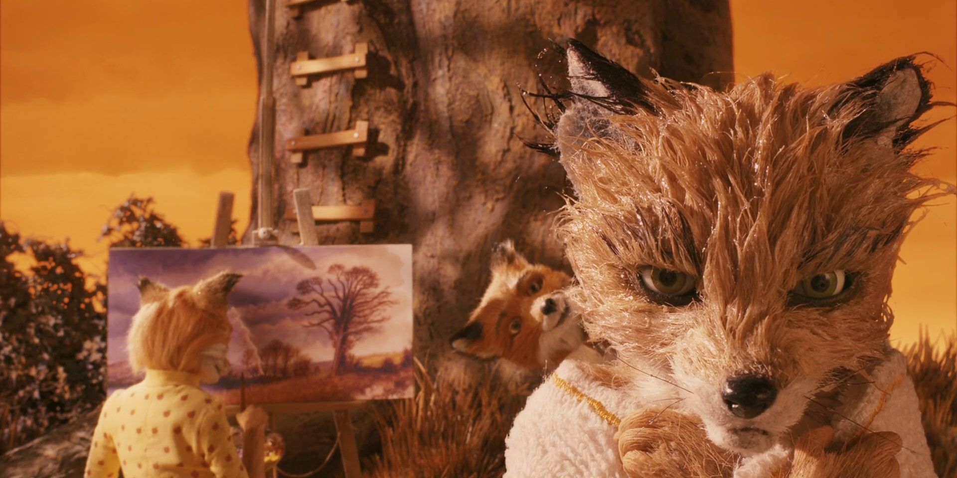Ash Fox drying off while Mrs Fox paints by a tree in Fantastic Mr Fox.