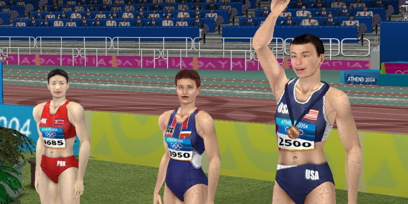 The three winners of an Olympic comntest saluting in the Athens 2004 video game