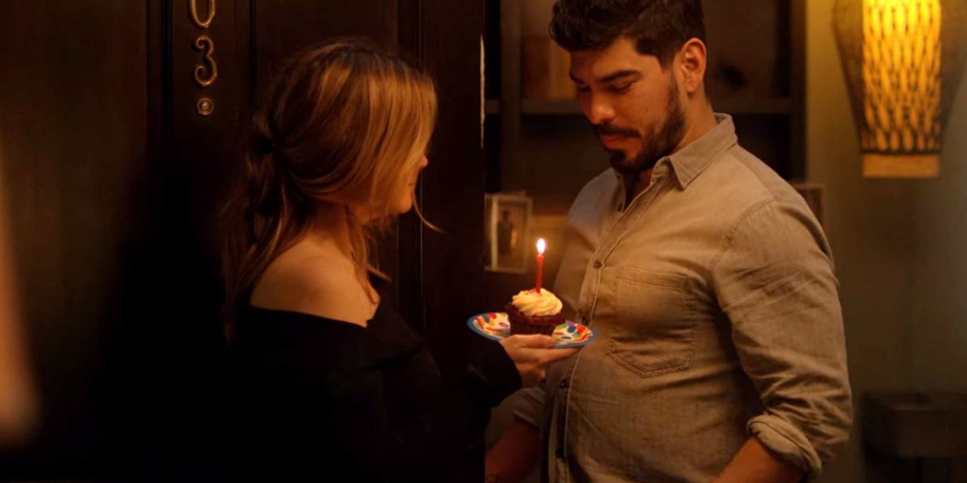 Elsa offer a birthday cupcake to Nick in Atypical