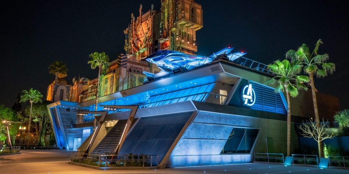 Avengers Campus Headquarters light up at night