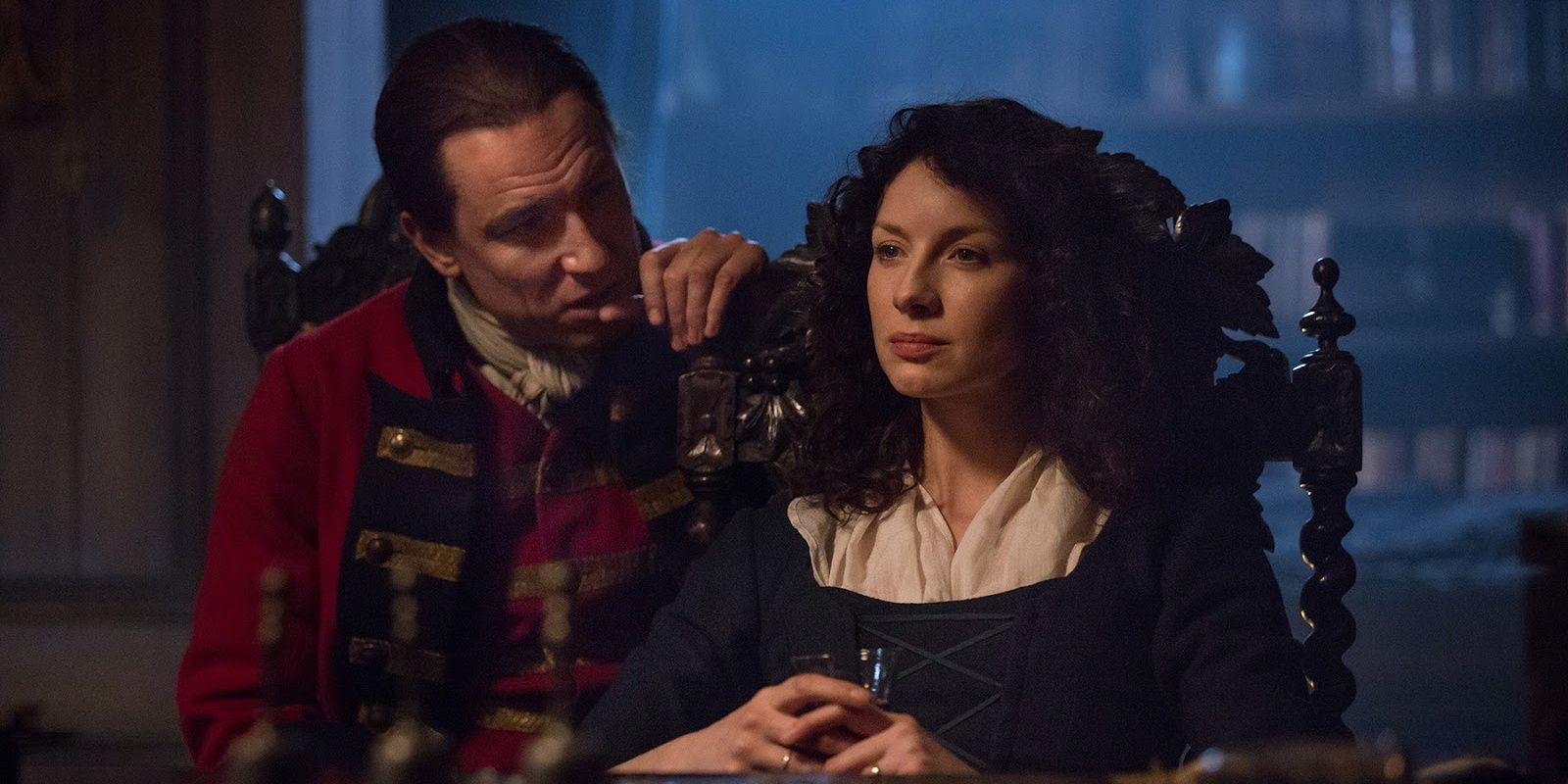 Image of Black Jack Randall taking to Claire in the Chaire Outlander