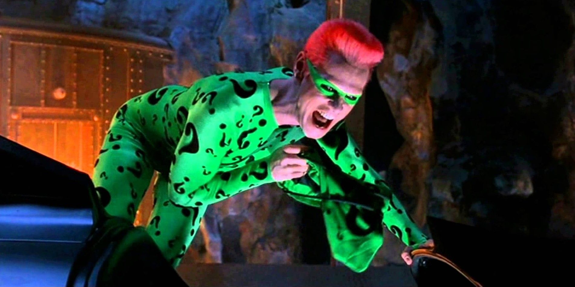 Riddler leaning forward and laughing in Batman: Forever