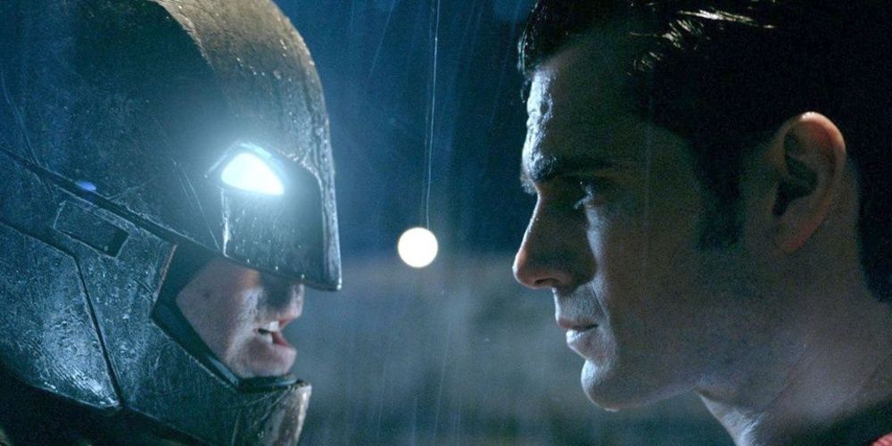 Batman and Superman talk in the rain in Dawn Of Justice