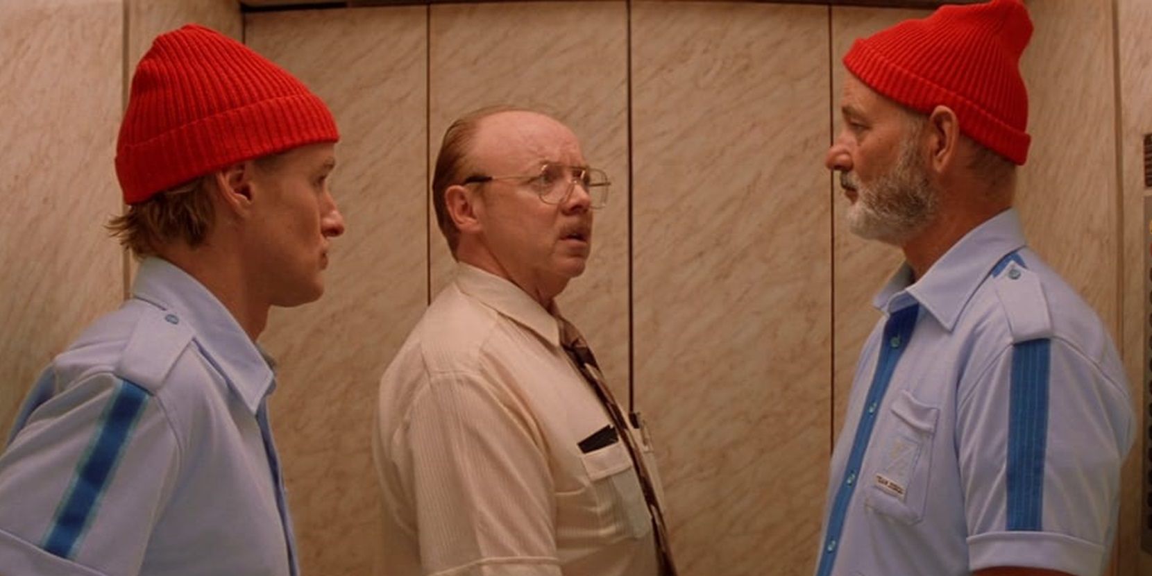 Bill Murray, Owen Wilson, and Bud Cort on an elevator in The Life Aquatic.