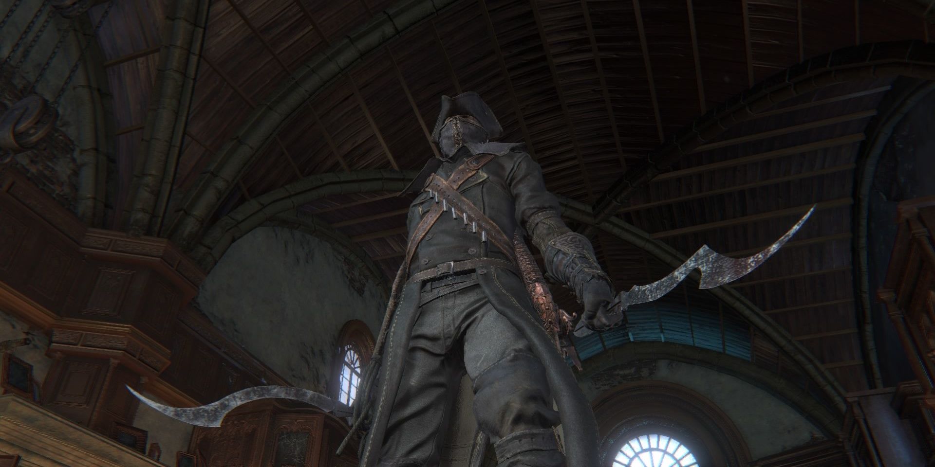 A bloodborne character wielding the Blade of Mercy.
