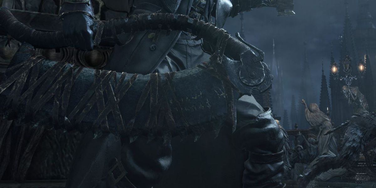 A hunter holding the Saw Cleaver in Bloodborne.