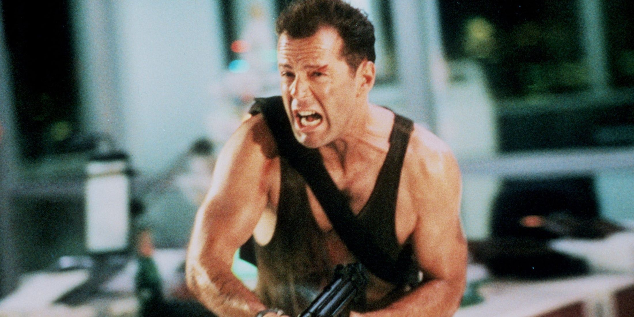 John McClane screaming with gun in Die Hard