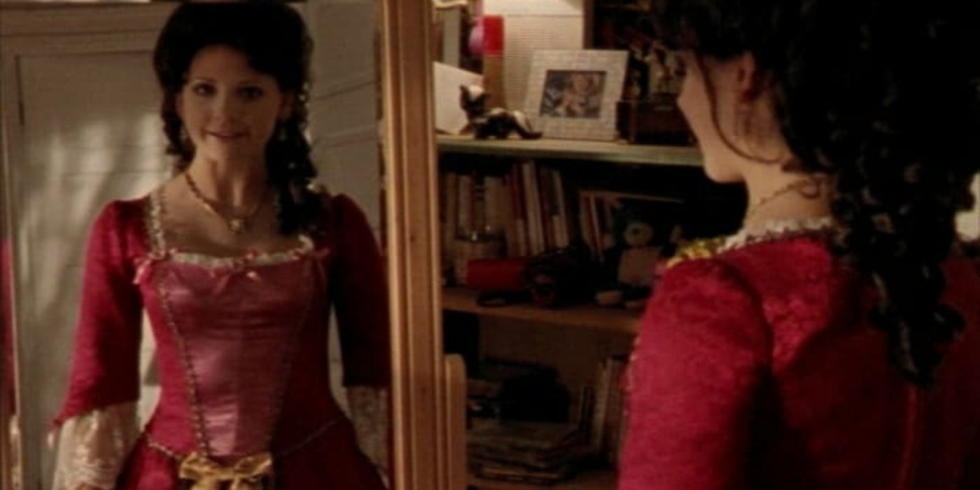 Buffy in her costume lookings at herself in the mirror in Buffy the Vampire Slayer