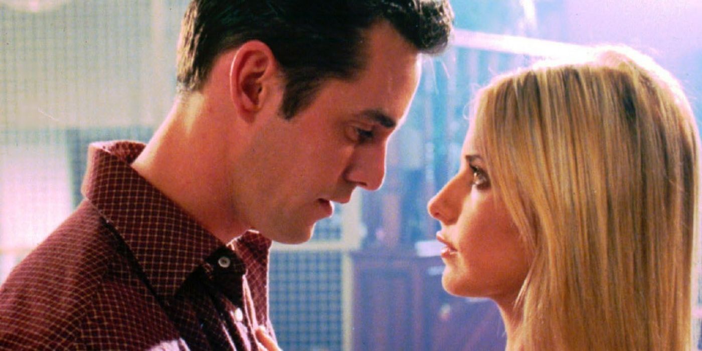 Buffy and Xander together as if about to kiss in Buffy the Vampire Slayer