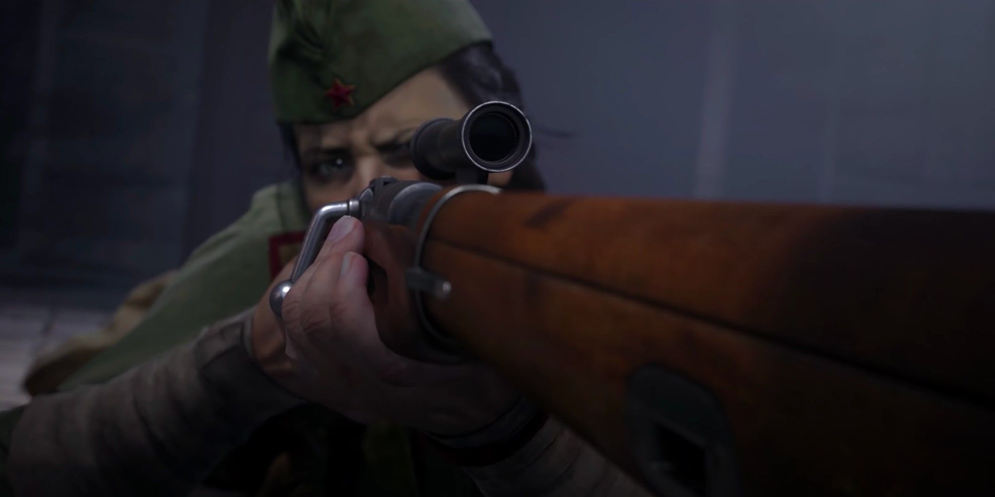 A soldier aims down the sights of a rifle in Call of Duty: Vanguard.