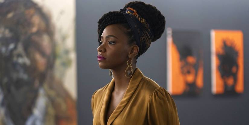 Brianna Cartwright stands in her art gallery in the 2021 film Candyman.