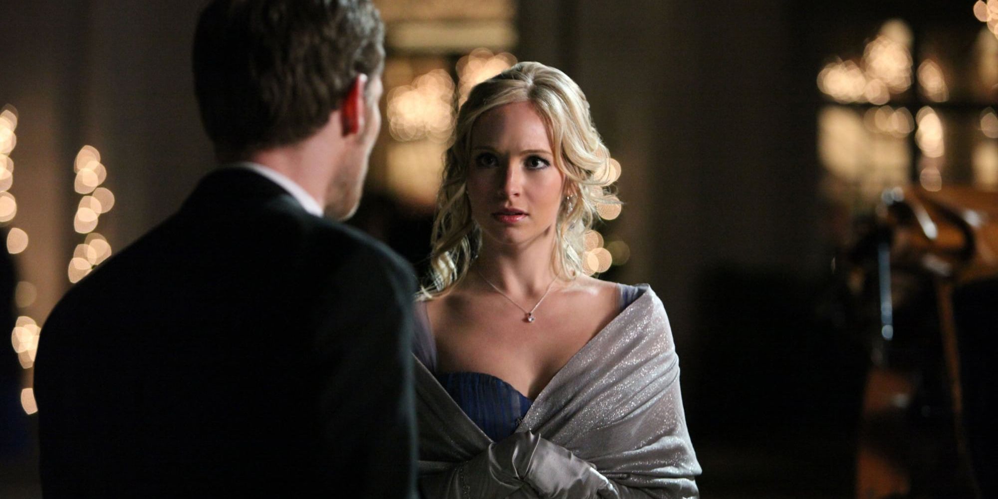 Klaus and Caroline at the ball in The Vampire Diaries.