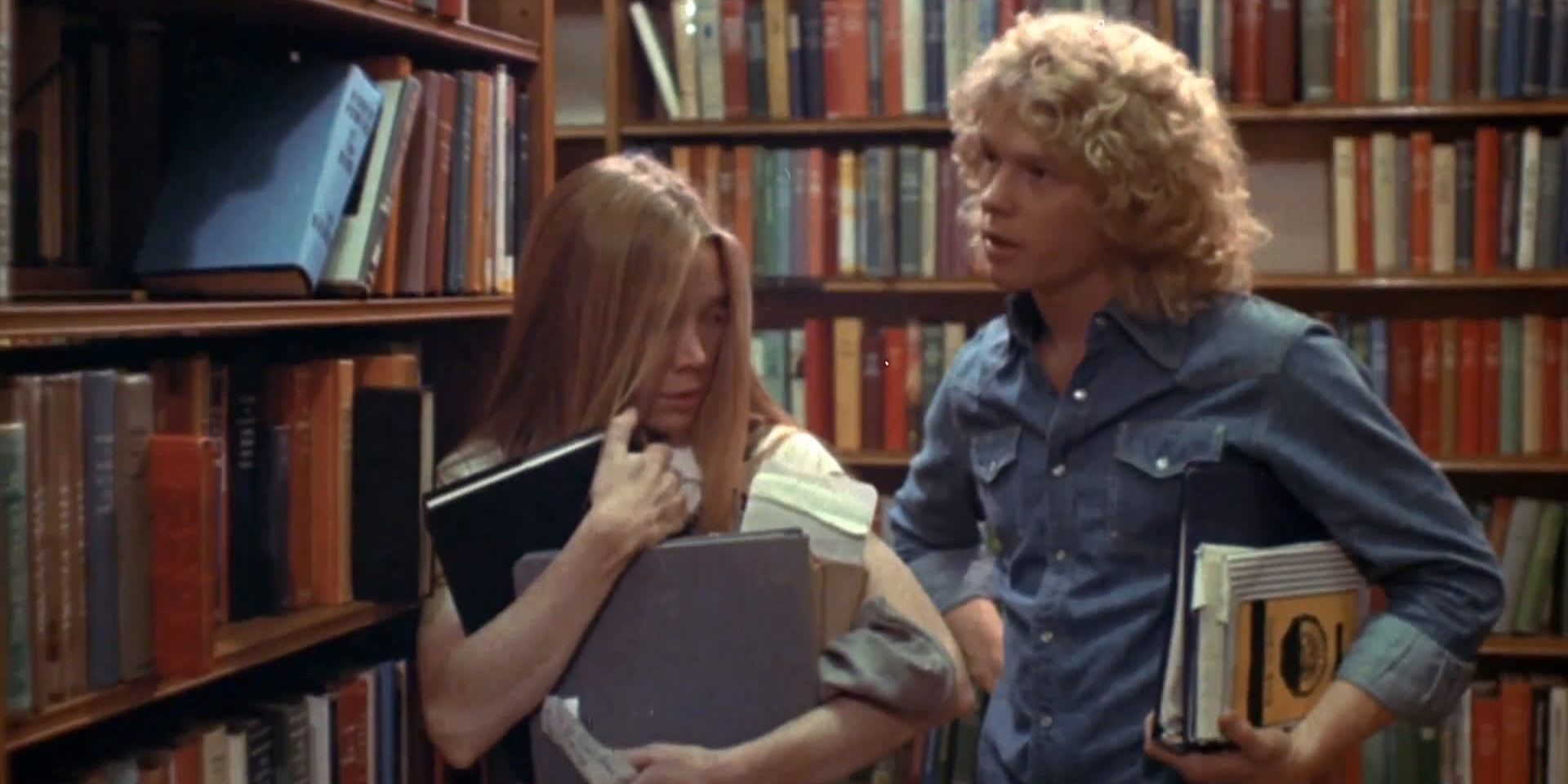 Carrie and Tommy in the library in Carrie