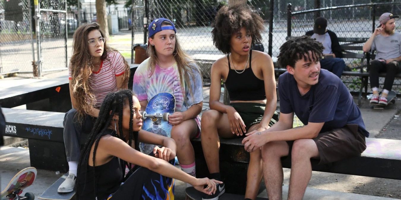 The Betties except Honeybear sitting with Charlie in Betty