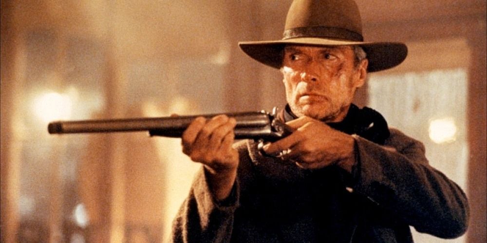 Clint Eastwood in Unforgiven, walking through a house with a long barrelled gun