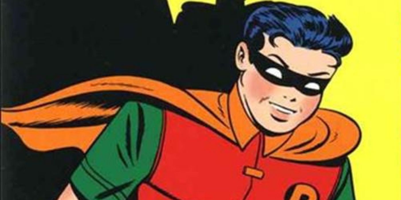 Dick Grayson in his Robin costime smiling in the cover of a Golden Age Batman comic book