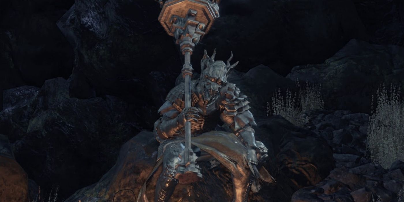 Eygon of Carim sitting on a rock in Dark Souls 3