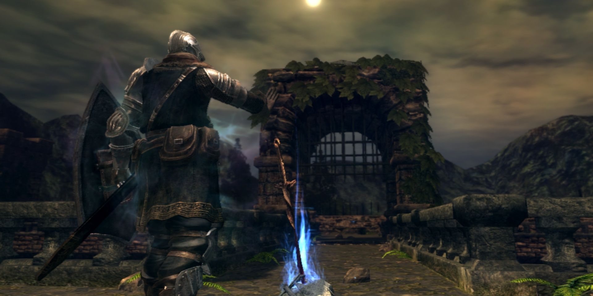 A player resting at a campfire in Dark Souls