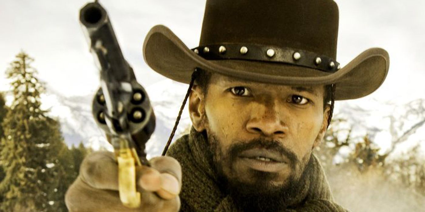 Django Freeman pointing a gun at someone.