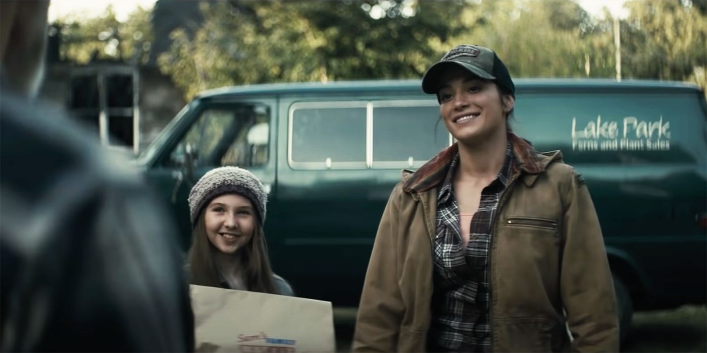 Hernandez (Stephanie Arcila) and Phoenix (Madlyn Grace) smiling and talking to someone off screen in Don't Breathe 2